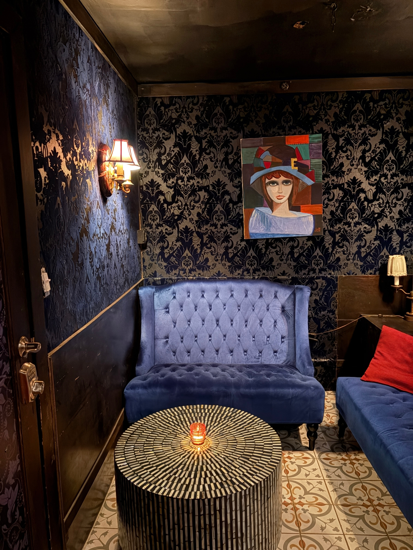 Velvet blue lounge inside Flying Figs Wine Bar